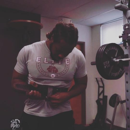 Korey adjusting a training belt